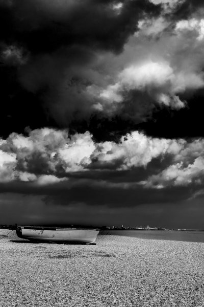 An Infrared image of one of the last boats left on the beach at Dunwich with April showers threatening overhead.